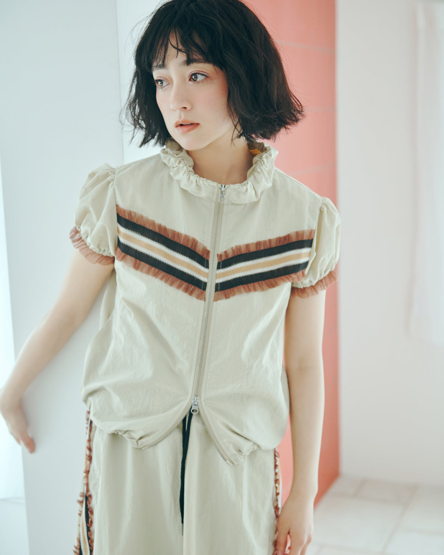 Frill Line Zip Tops