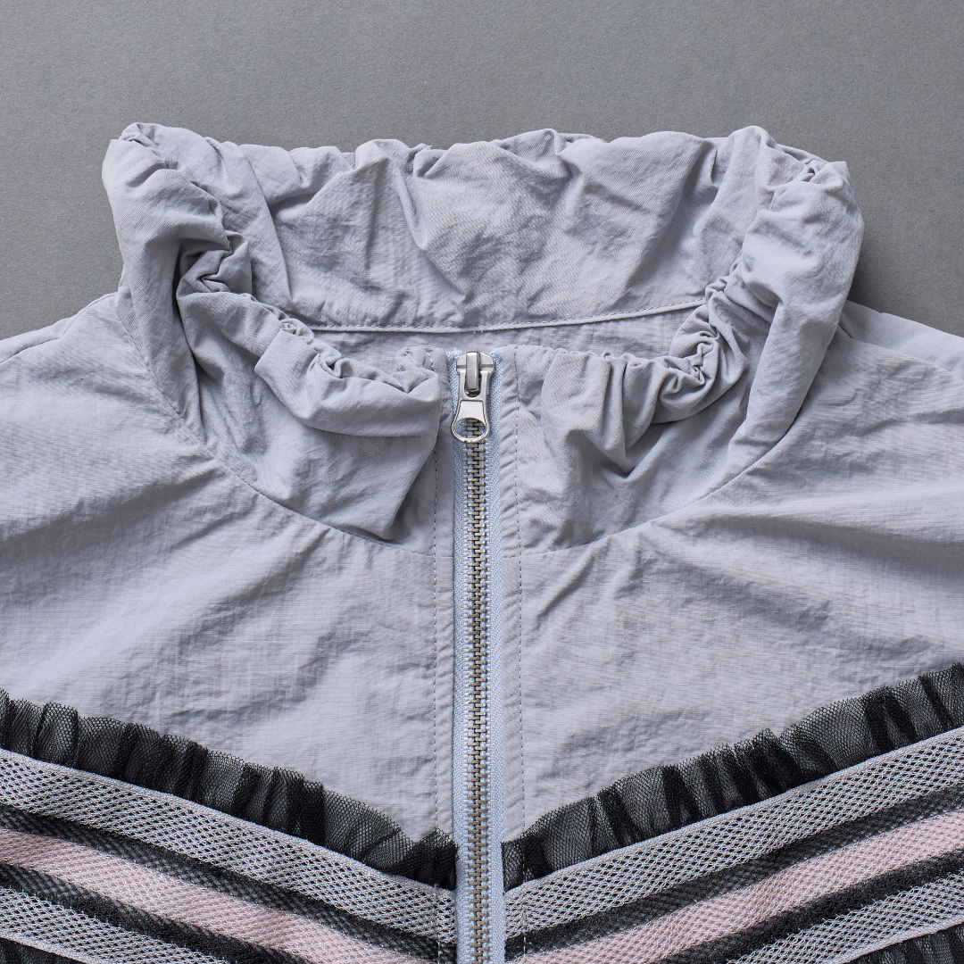 Frill Line Zip Tops