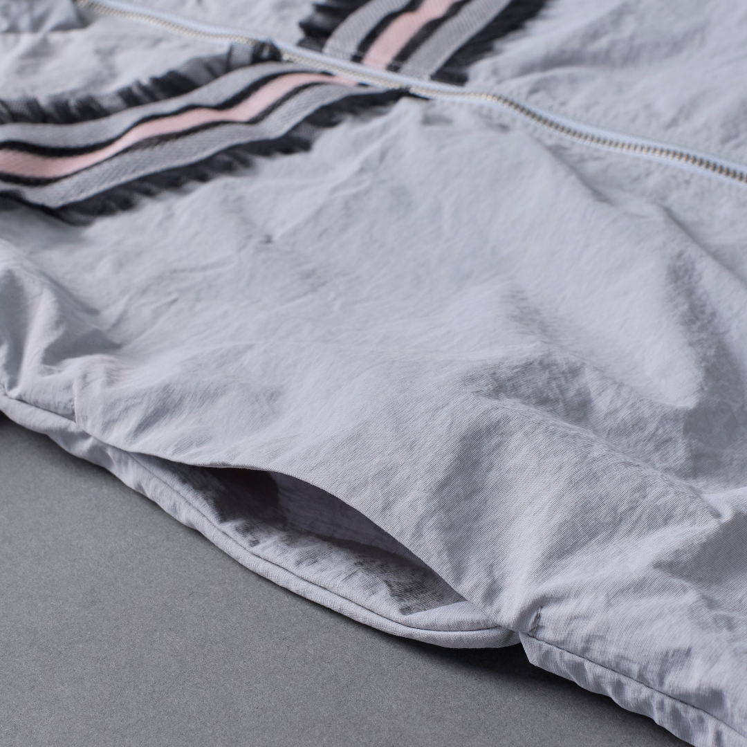 Frill Line Zip Tops