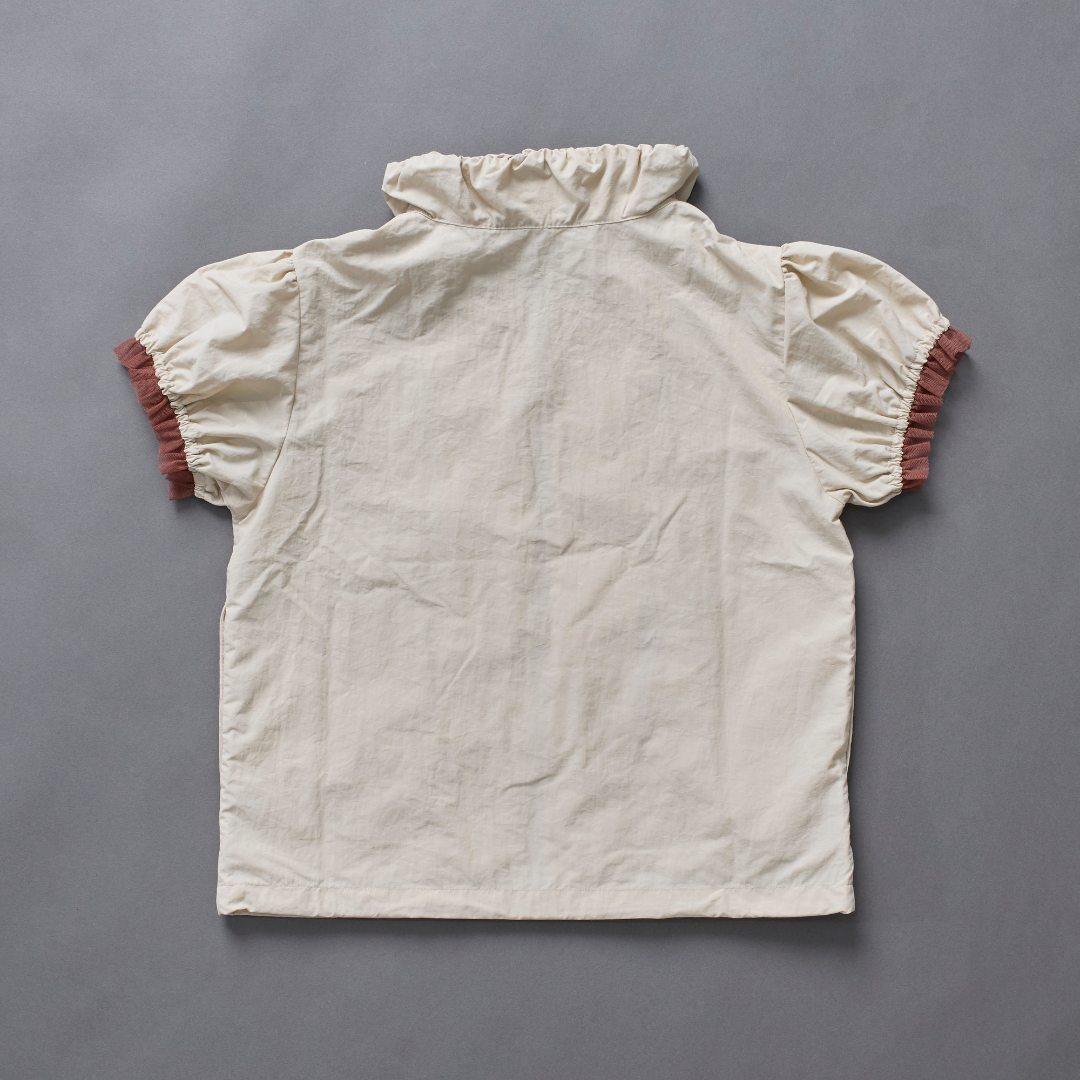 Frill Line Zip Tops